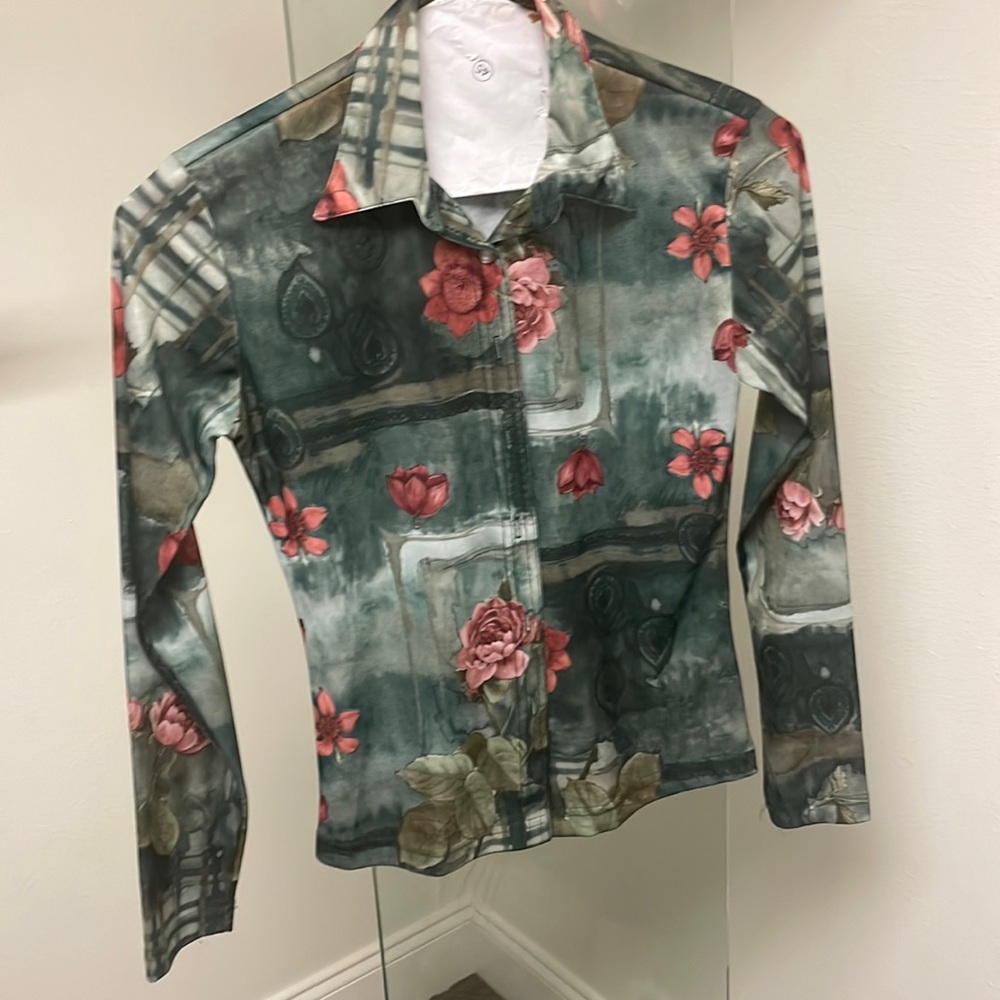 Green shirt vintage 1990s. I think from rave or body shop.  Beautiful 90's shirt